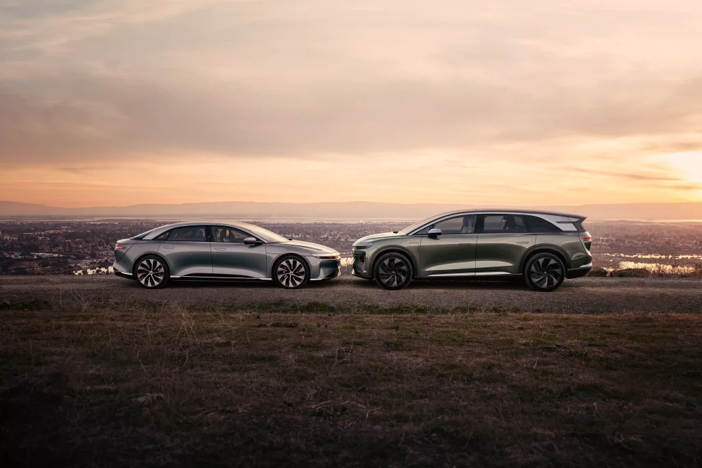 Lucid Air sedan and Gravity SUV side by side showcasing the company's growing vehicle lineup and consistent design language